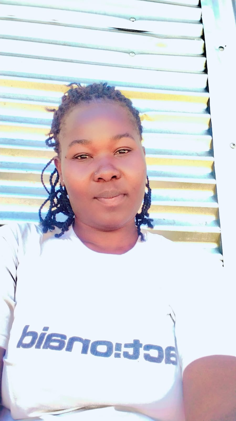 Celestine Mbayi - Member